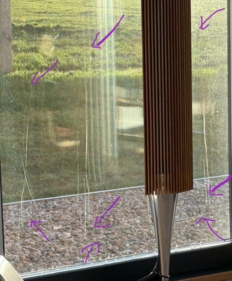 Scratched residential glass in Aberdeen before restoration