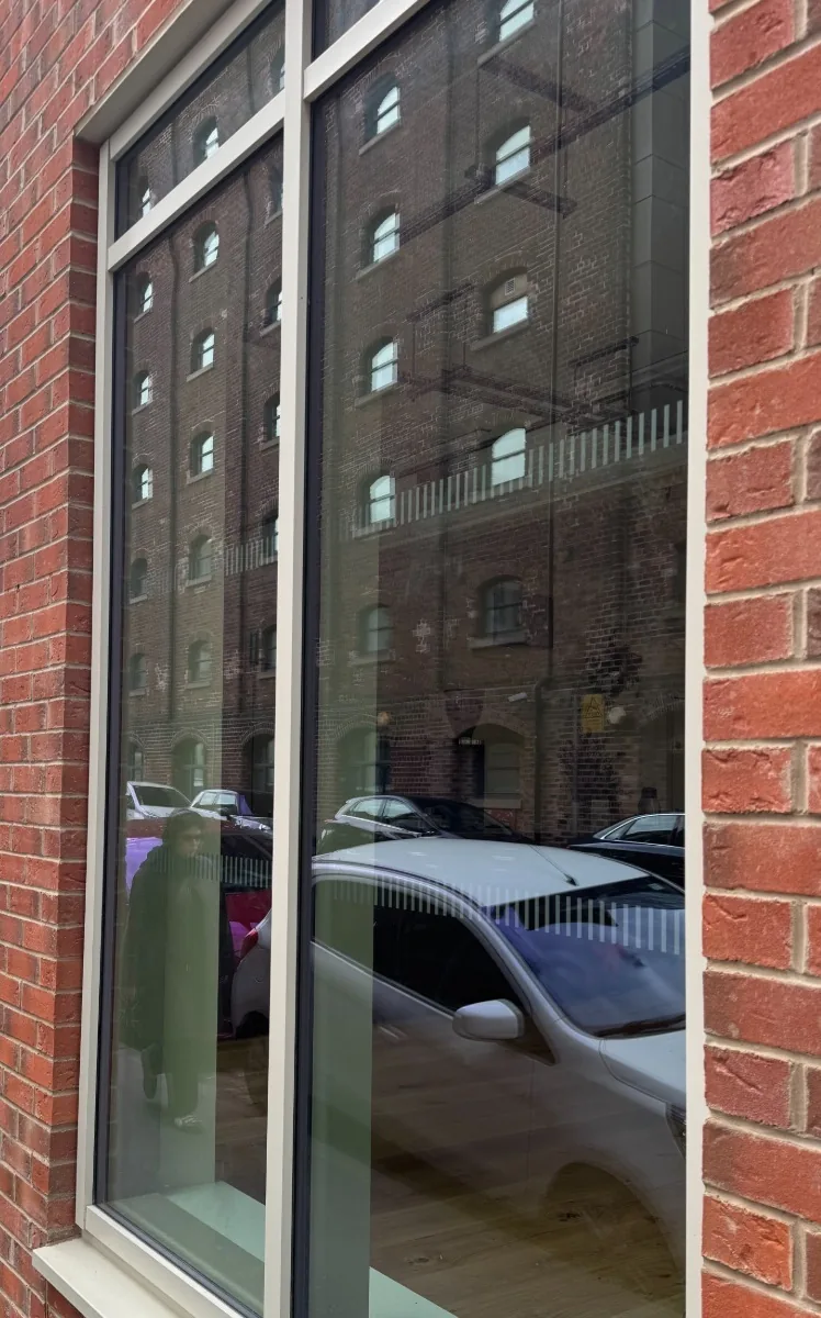 Commercial window glass in Edinburgh after restoration, with the scratches removed
