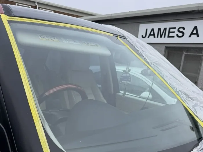 Same windscreen after restoration, clear with no visible scratches