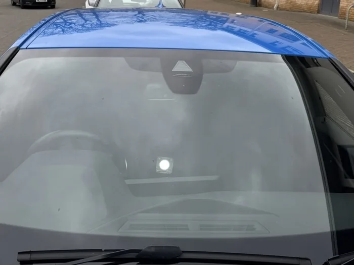 Same windscreen after full-surface restoration, clear with no visible wear
