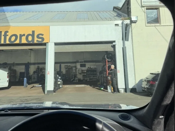 Same windscreen after restoration, clear with no visible wiper-arc scratches